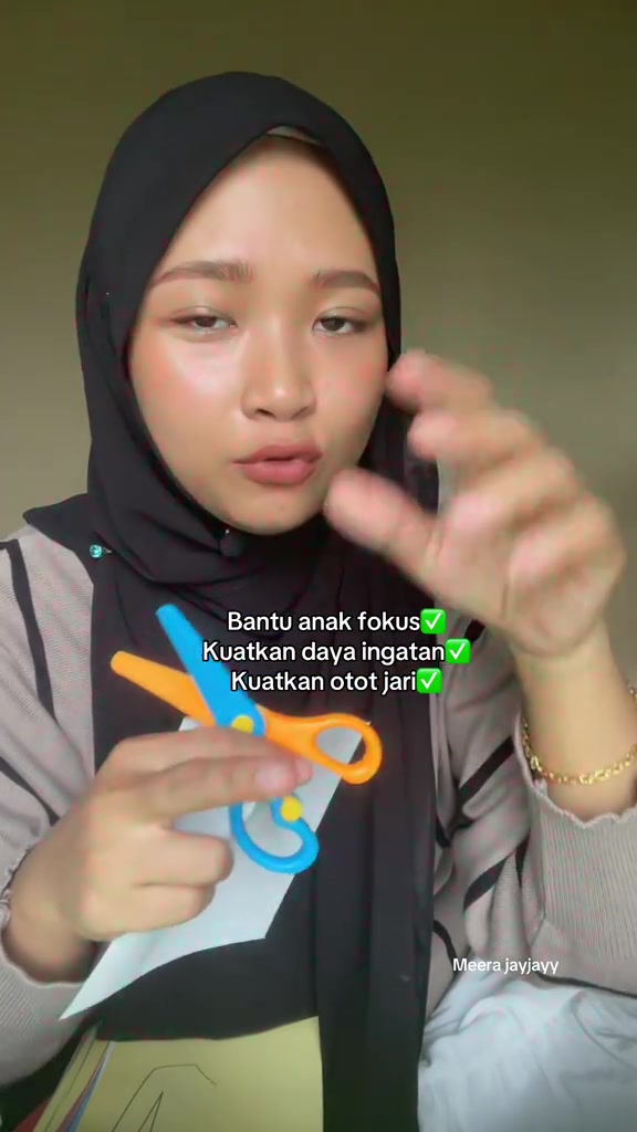 Menekan gunting